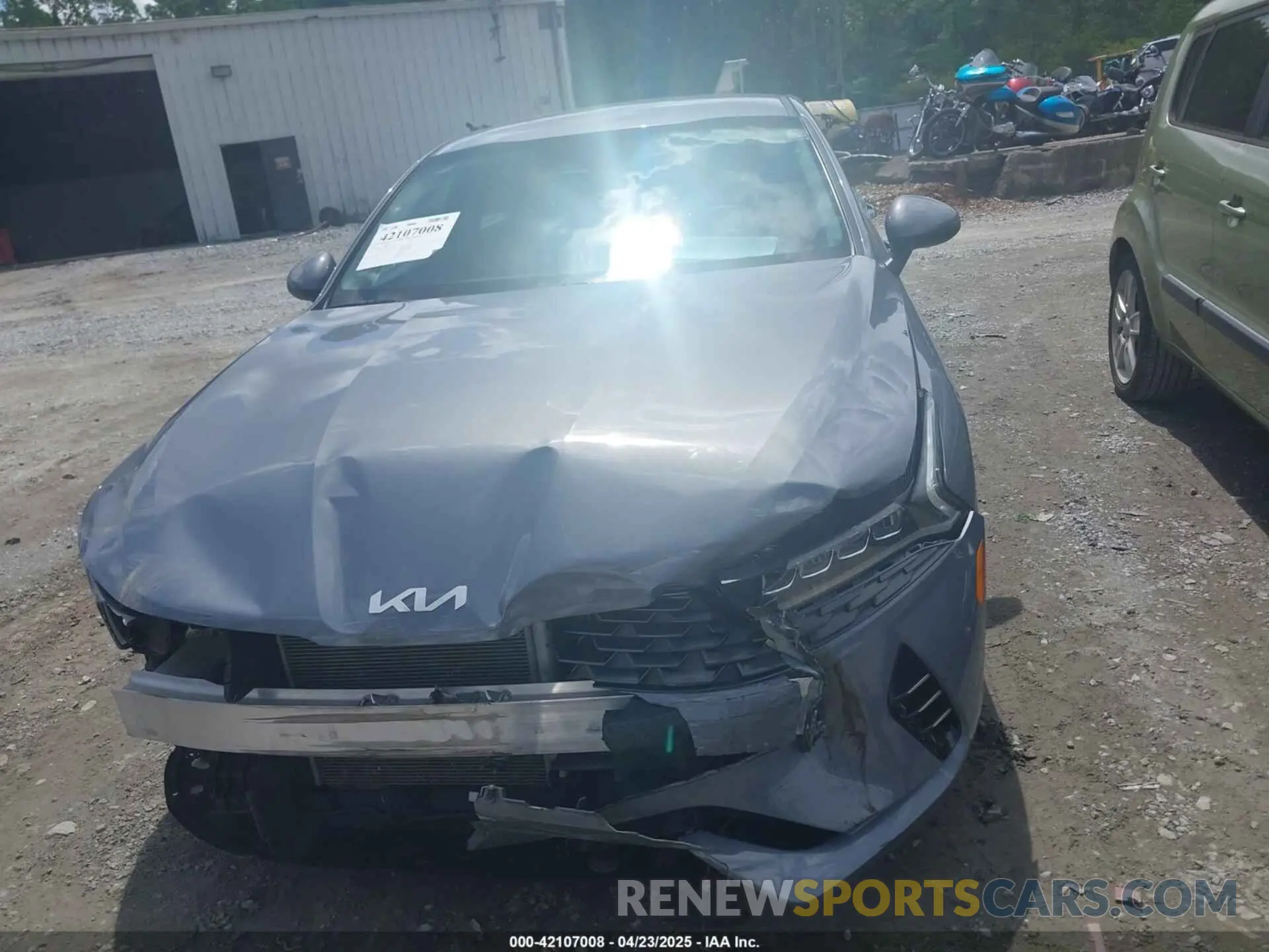 12 Photograph of a damaged car 5XXG14J25NG130168 KIA K5 2022
