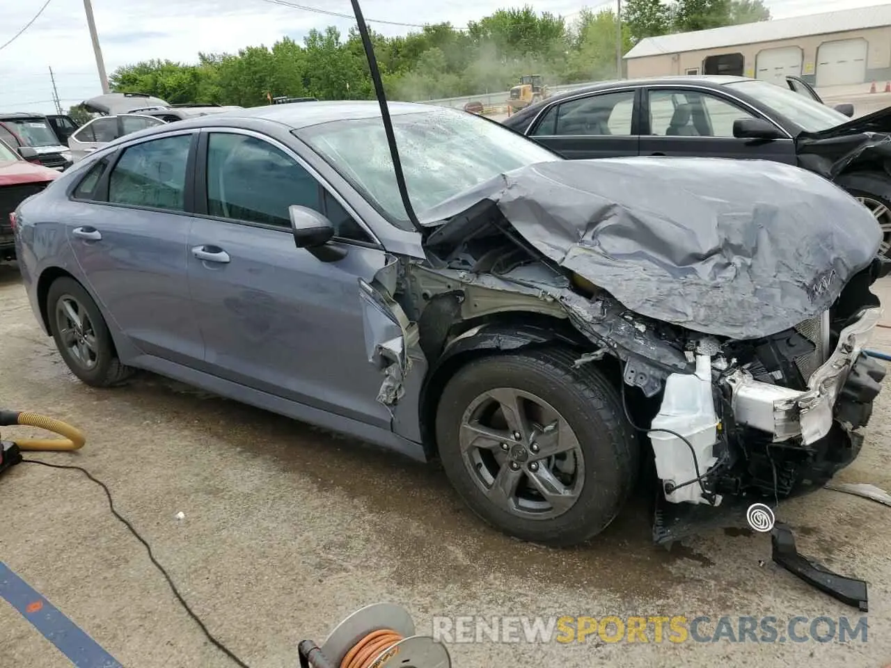 4 Photograph of a damaged car 5XXG14J26NG102668 KIA K5 2022