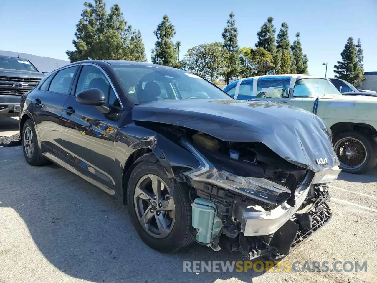 4 Photograph of a damaged car 5XXG14J26NG104419 KIA K5 2022