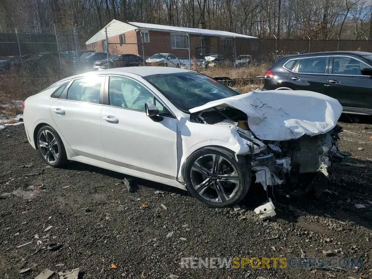 4 Photograph of a damaged car 5XXG14J26NG125318 KIA K5 2022
