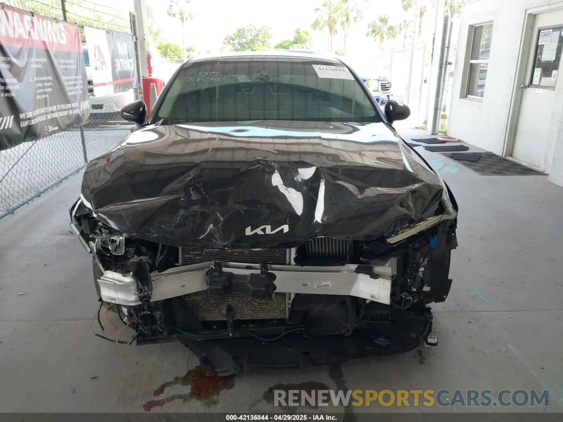 13 Photograph of a damaged car 5XXG14J28NG105572 KIA K5 2022
