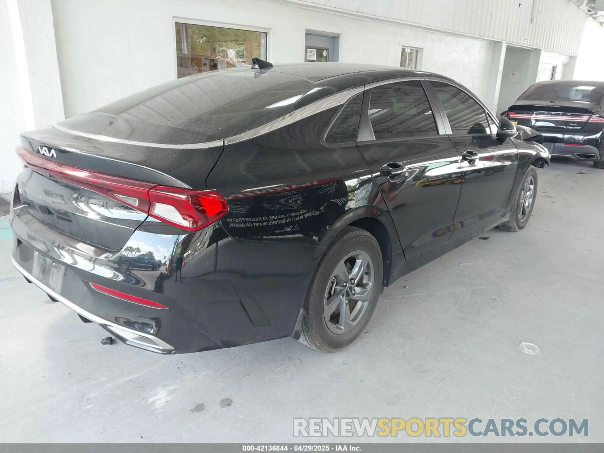 4 Photograph of a damaged car 5XXG14J28NG105572 KIA K5 2022