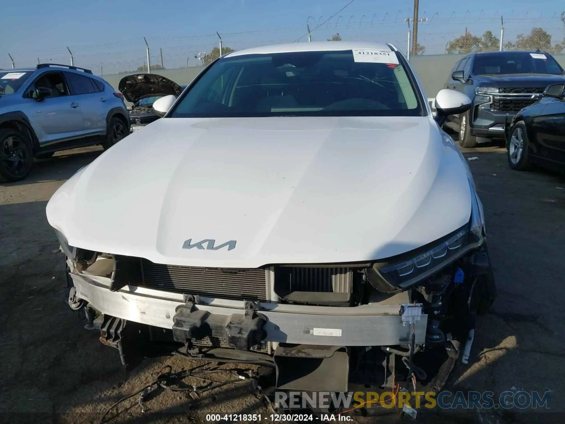 13 Photograph of a damaged car 5XXG14J28NG123134 KIA K5 2022