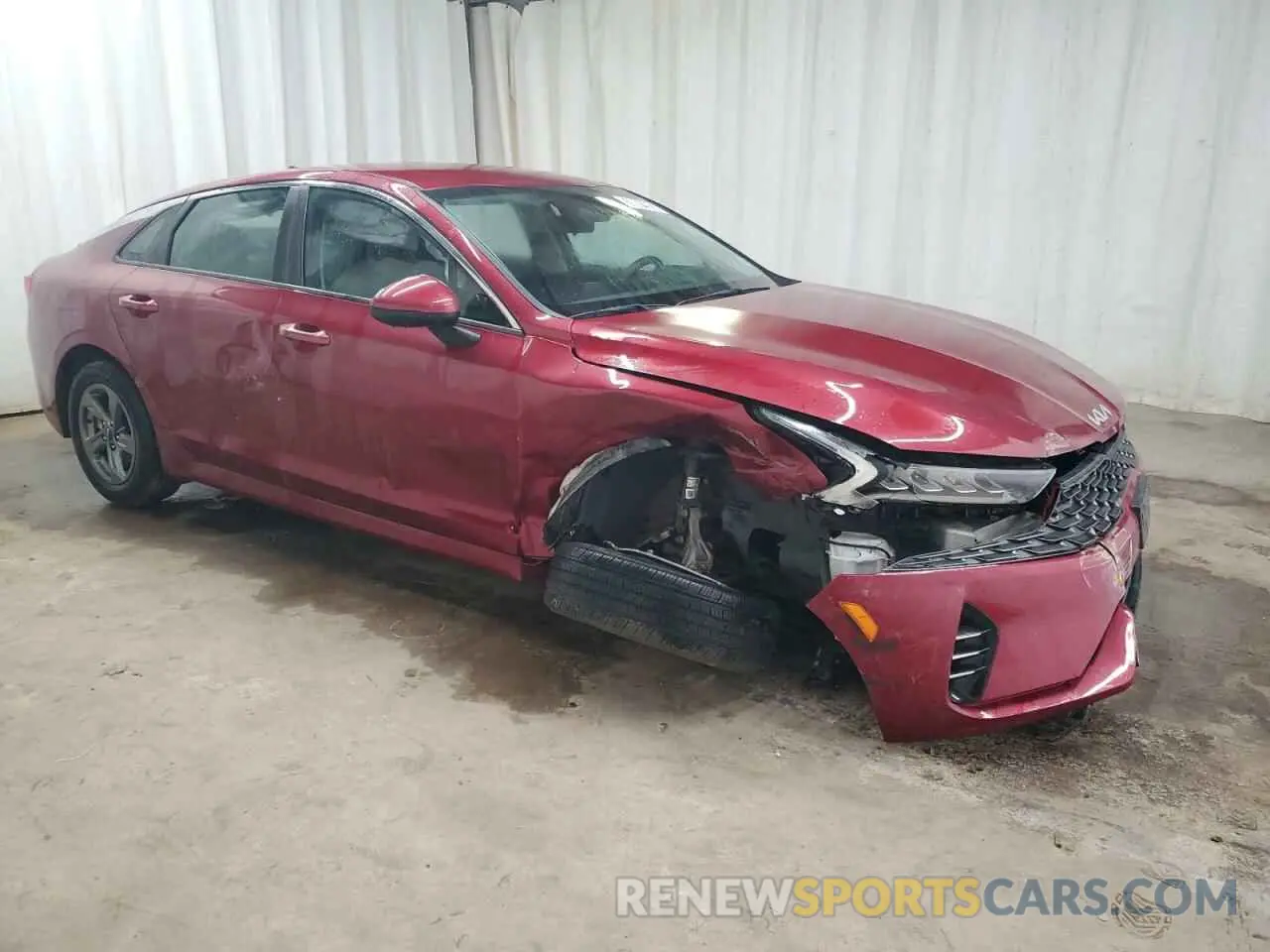 4 Photograph of a damaged car 5XXG14J2XNG085809 KIA K5 2022