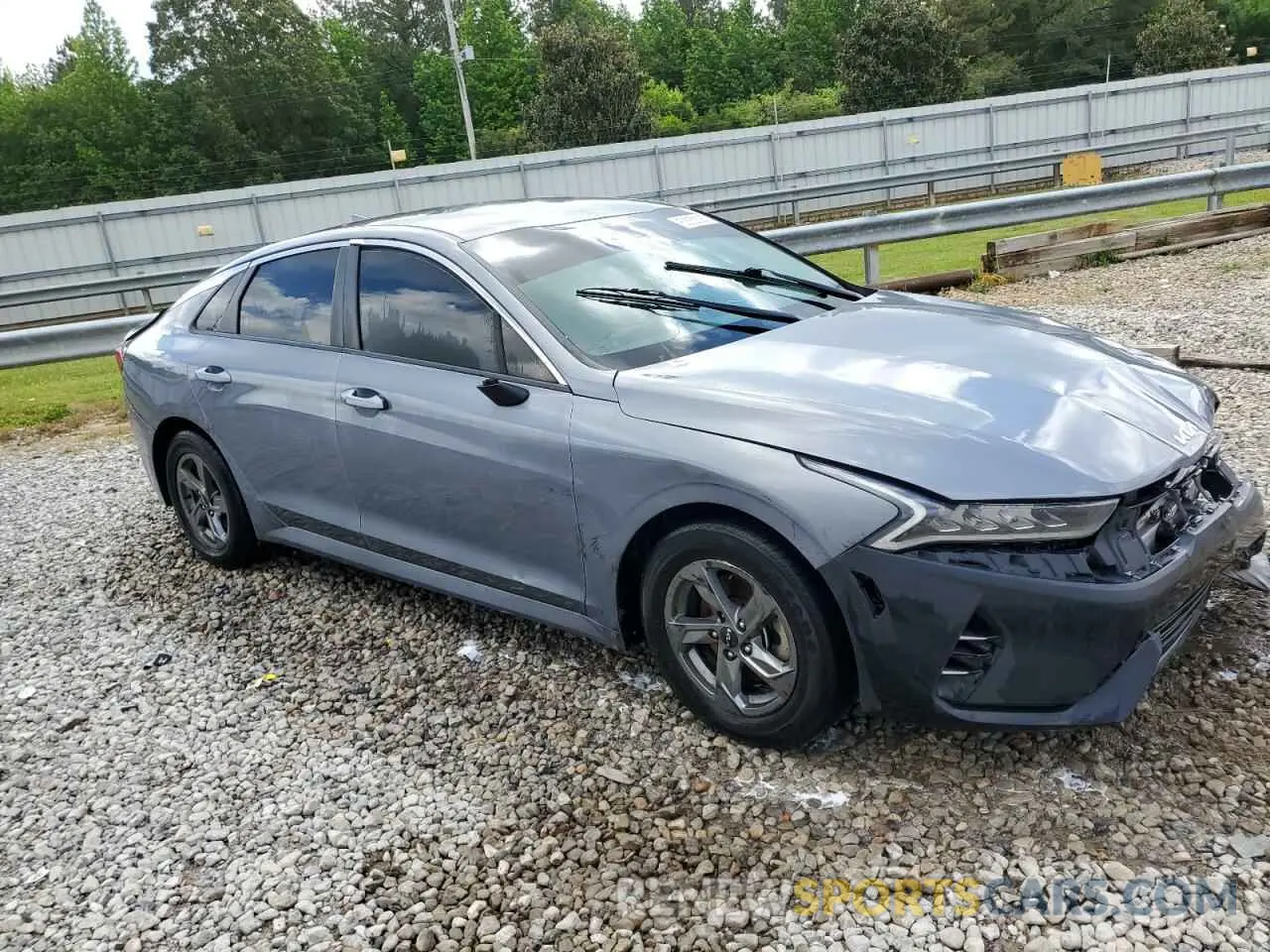 4 Photograph of a damaged car 5XXG14J2XNG150660 KIA K5 2022