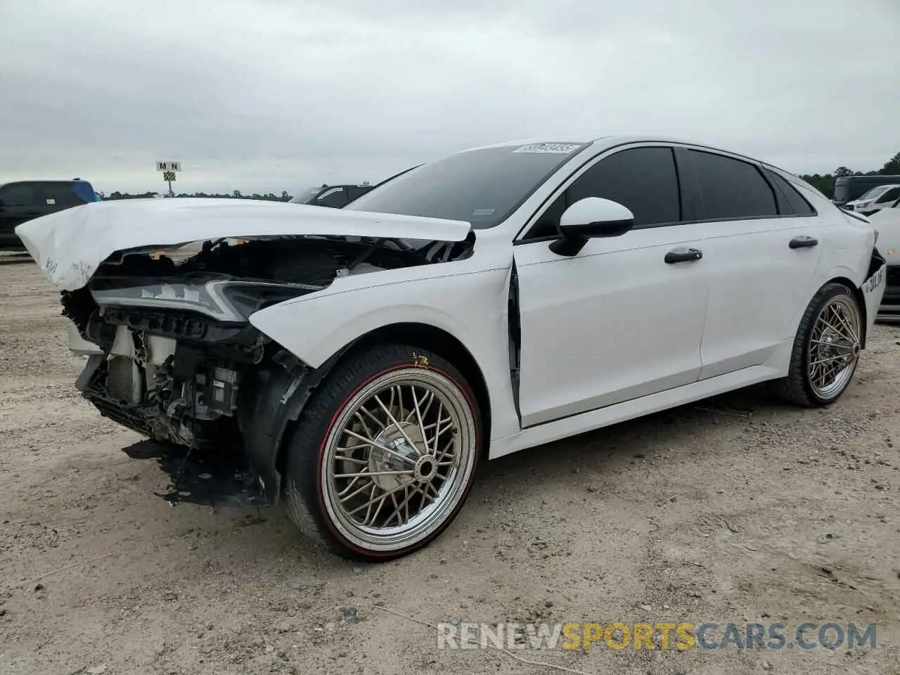 1 Photograph of a damaged car 5XXG24J22NG107752 KIA K5 2022