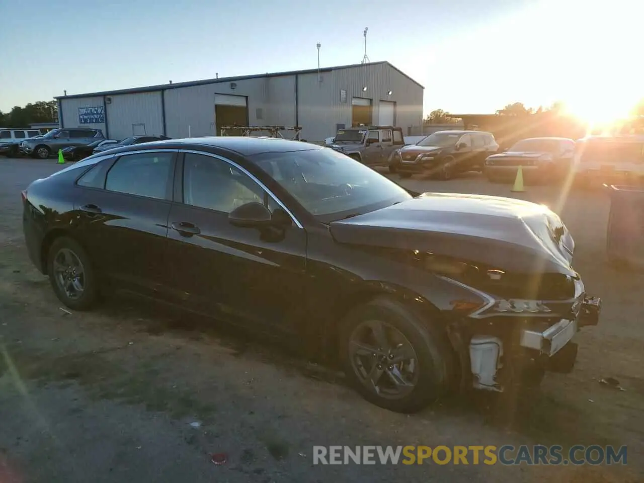 4 Photograph of a damaged car 5XXG24J26NG100187 KIA K5 2022