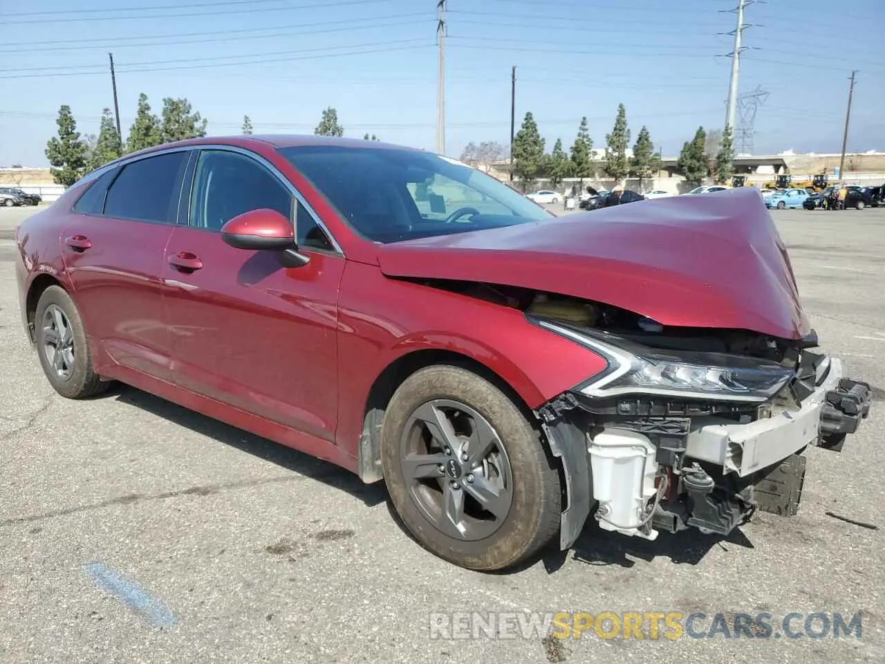 4 Photograph of a damaged car 5XXG24J29NG098970 KIA K5 2022