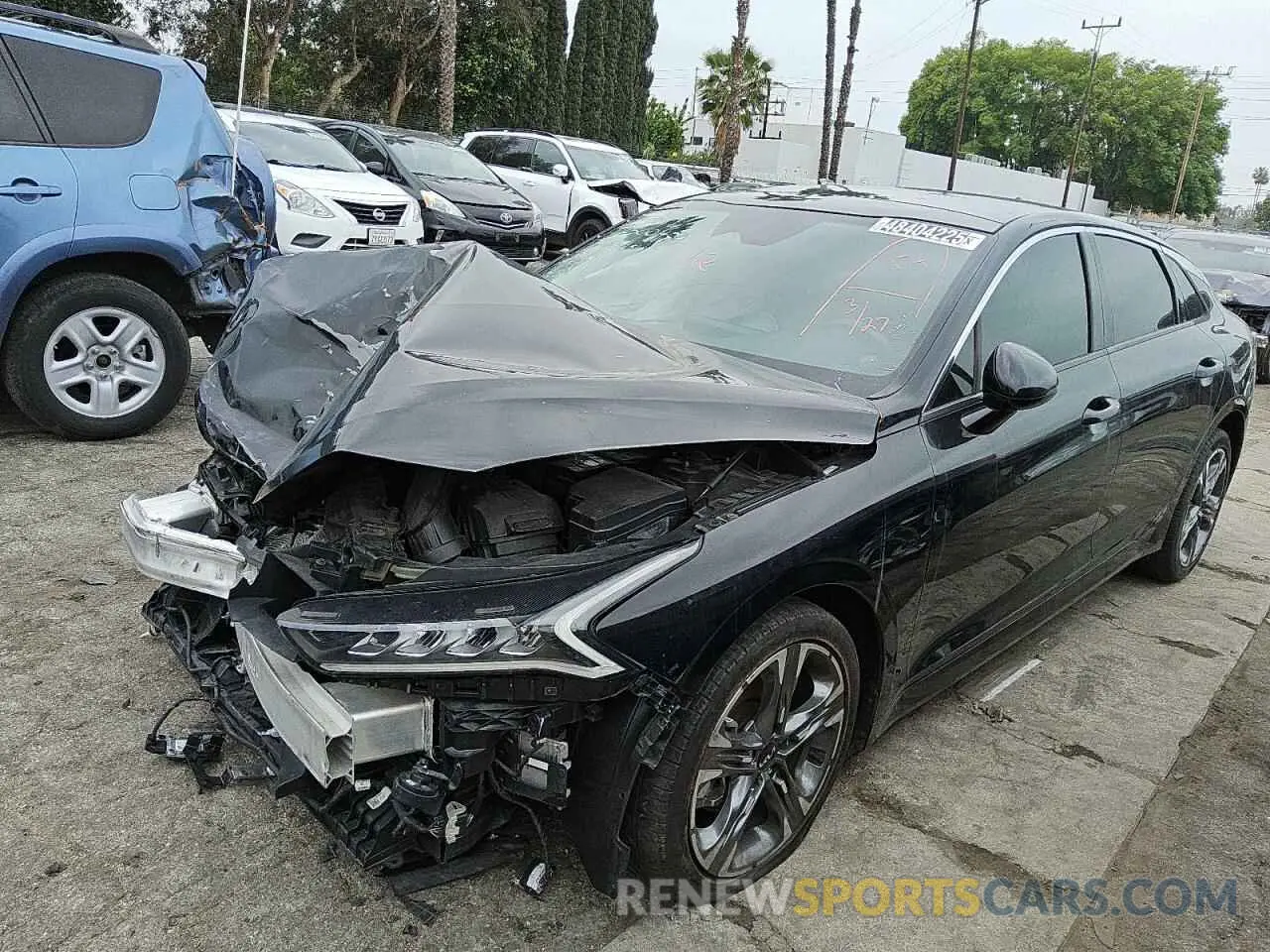 1 Photograph of a damaged car 5XXG34J20NG089992 KIA K5 2022