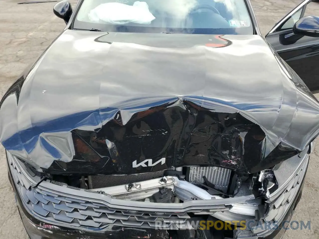12 Photograph of a damaged car 5XXG34J23NG148985 KIA K5 2022
