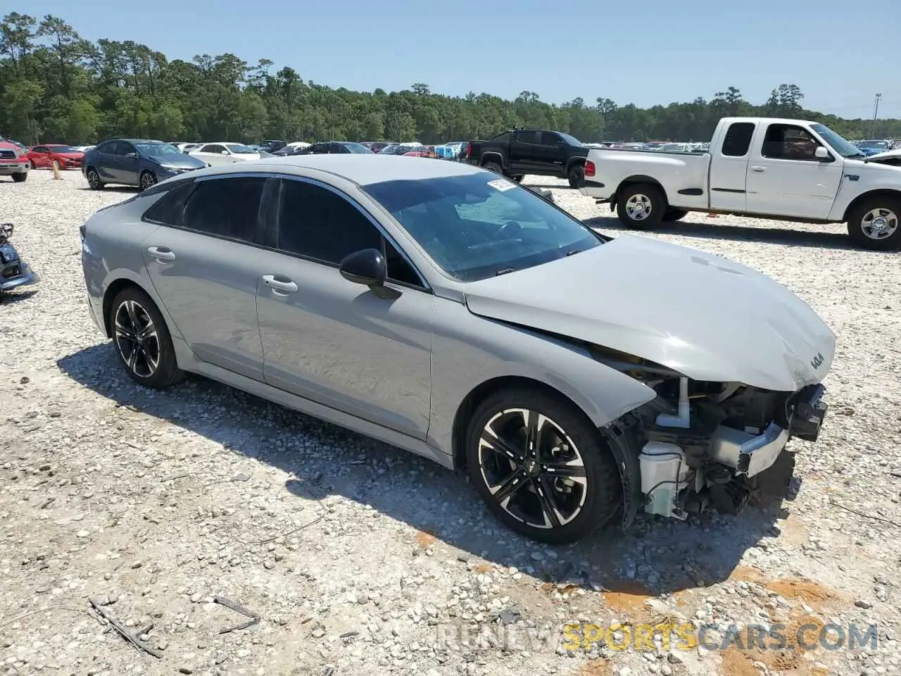 4 Photograph of a damaged car 5XXG64J20NG131570 KIA K5 2022
