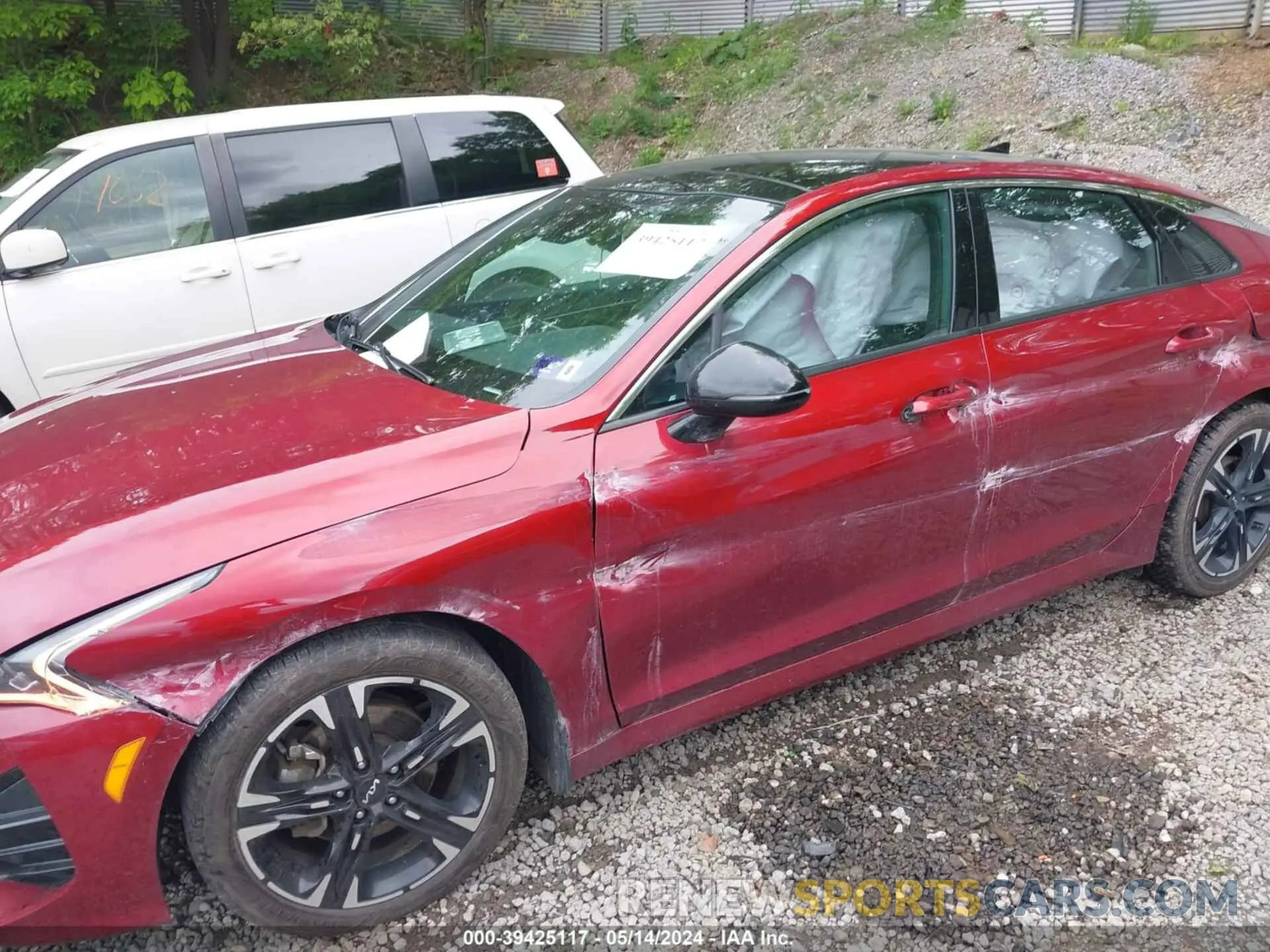 21 Photograph of a damaged car 5XXG64J21NG096098 KIA K5 2022