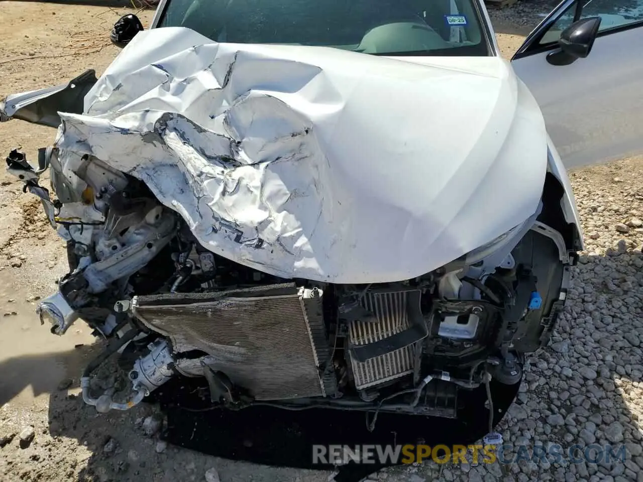 11 Photograph of a damaged car 5XXG64J21NG105494 KIA K5 2022
