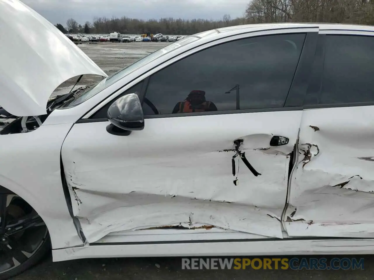 7 Photograph of a damaged car 5XXG64J22NG100028 KIA K5 2022