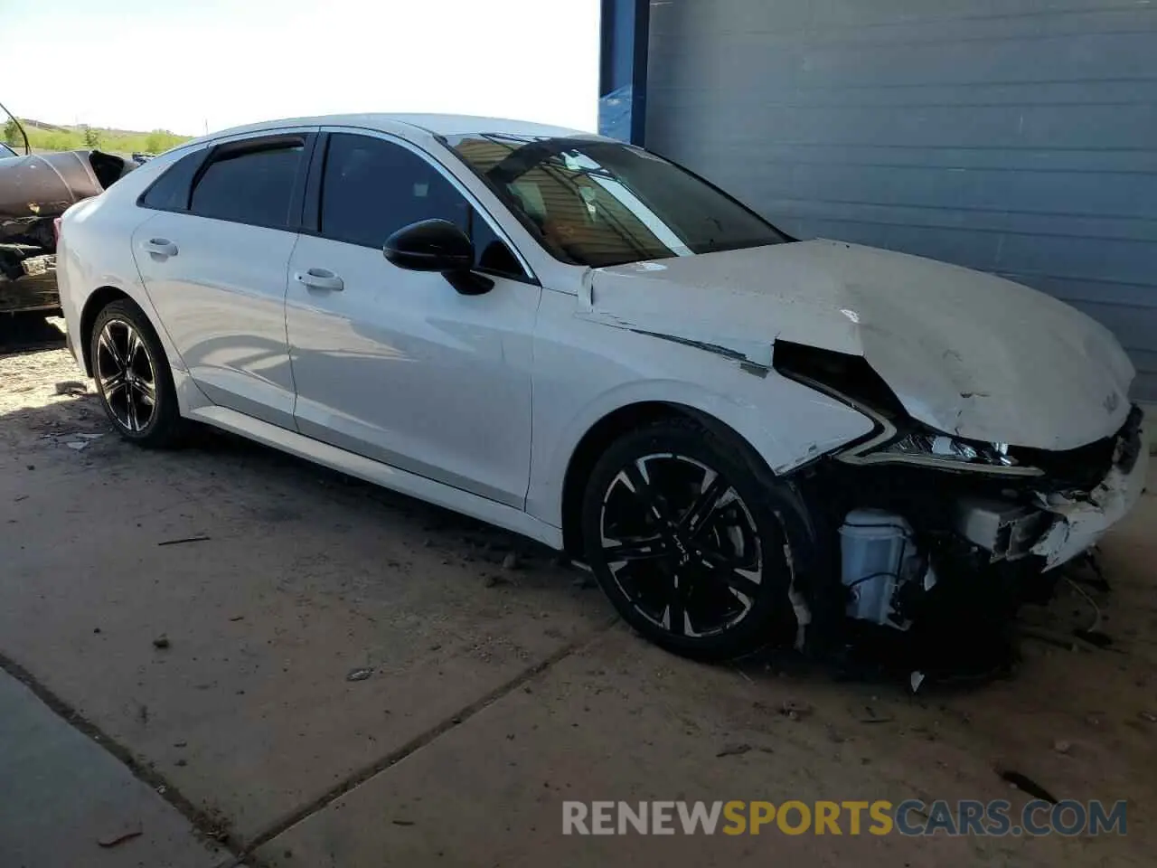 4 Photograph of a damaged car 5XXG64J23NG099178 KIA K5 2022