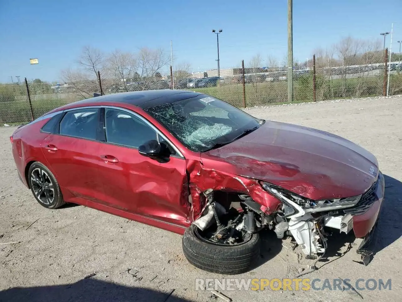 4 Photograph of a damaged car 5XXG64J23NG113080 KIA K5 2022