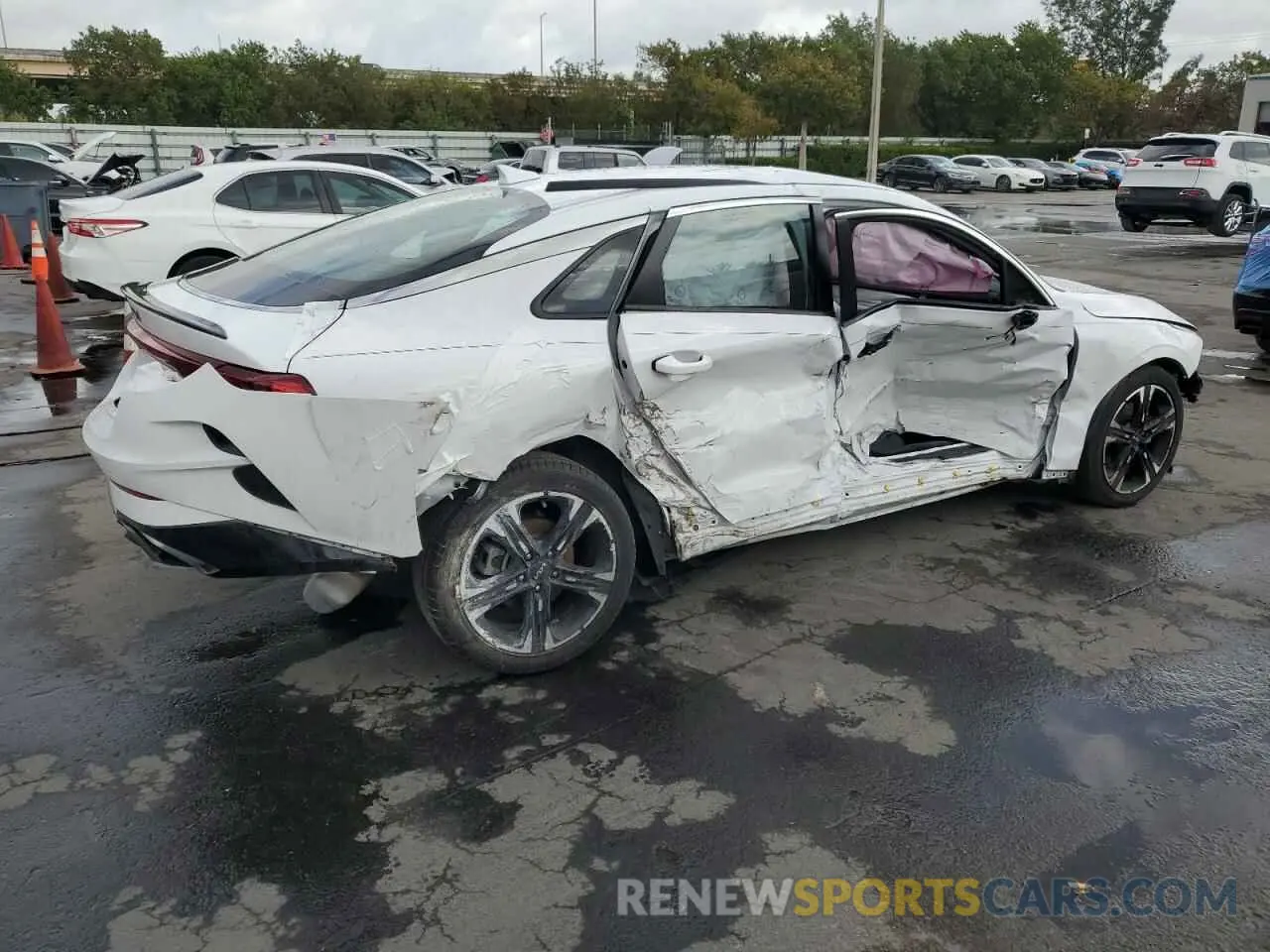 3 Photograph of a damaged car 5XXG64J23NG124306 KIA K5 2022