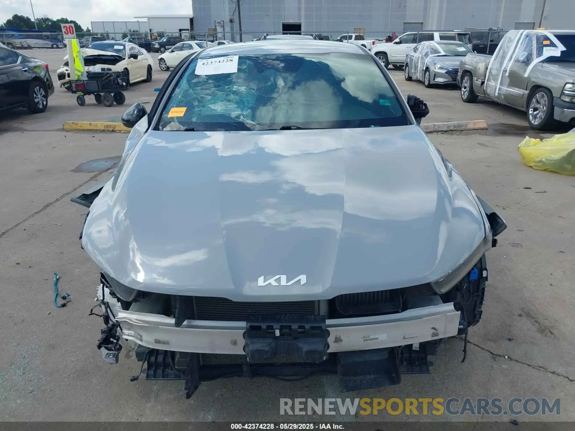 12 Photograph of a damaged car 5XXG64J26NG142749 KIA K5 2022