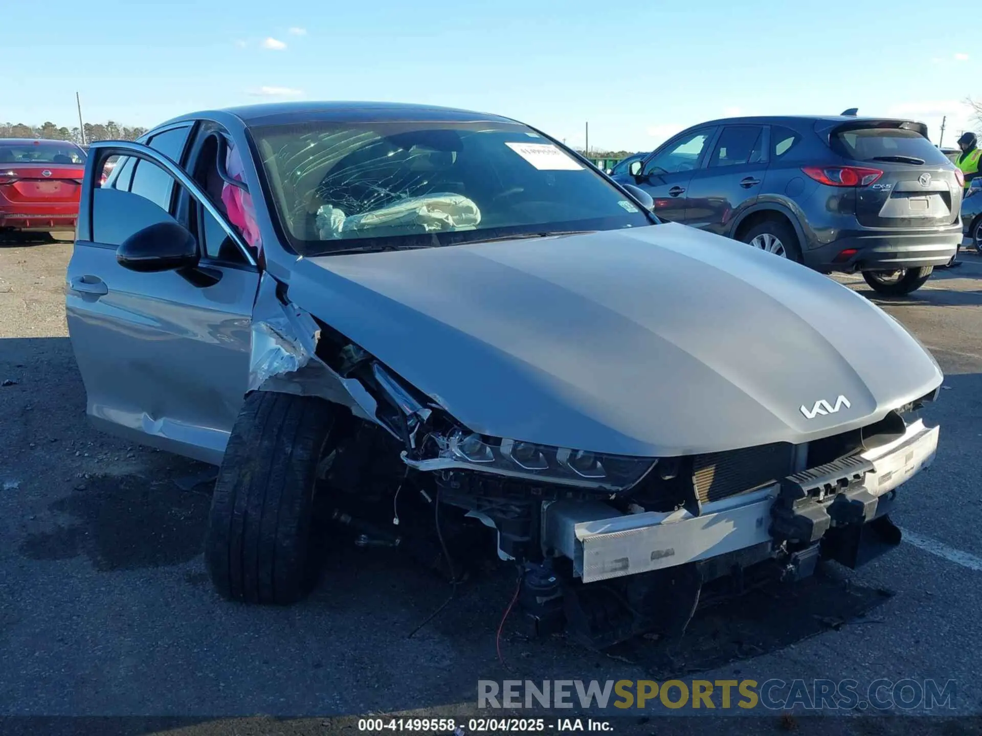 1 Photograph of a damaged car 5XXG64J27NG109923 KIA K5 2022