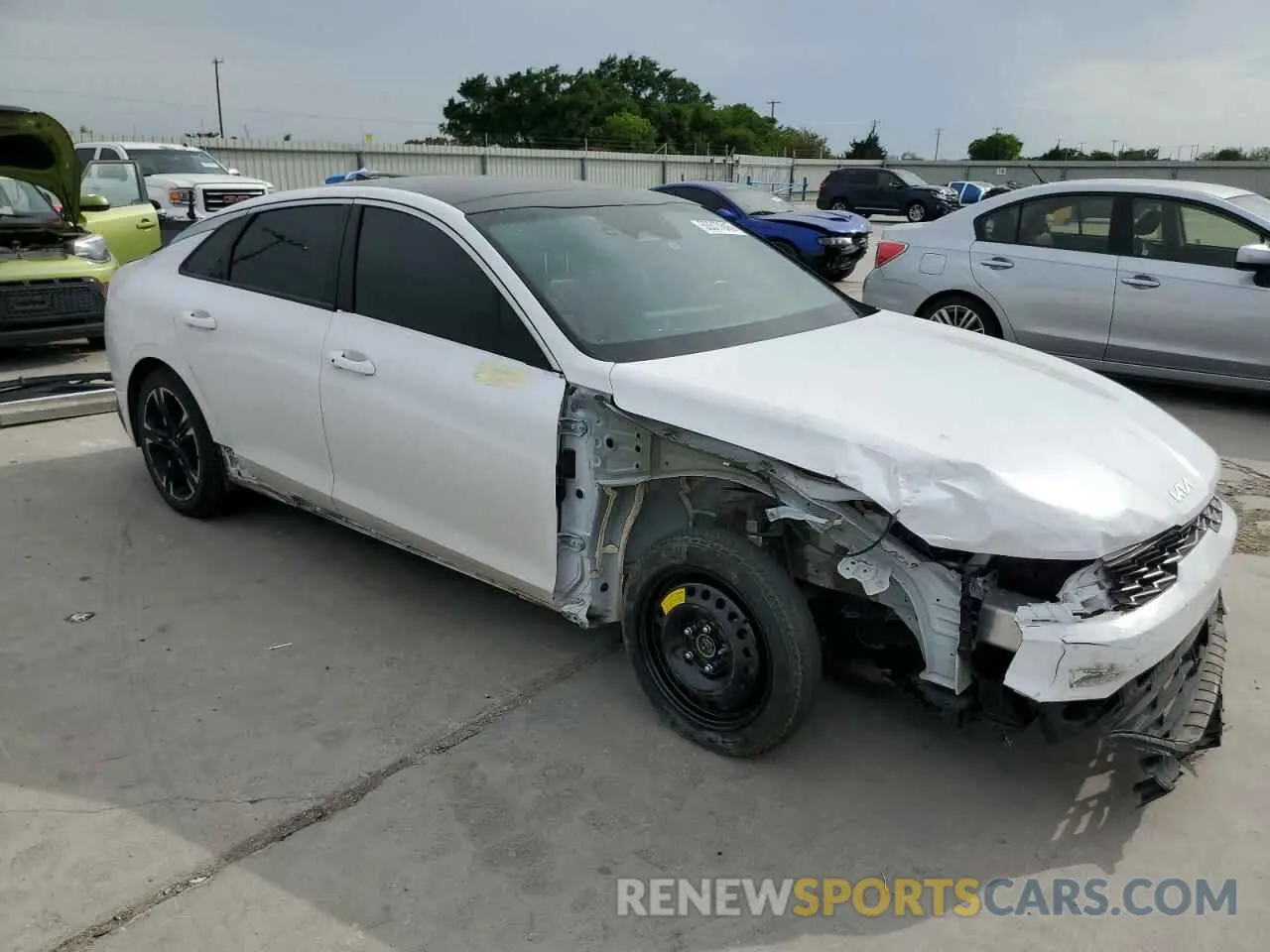4 Photograph of a damaged car 5XXG64J28NG096146 KIA K5 2022
