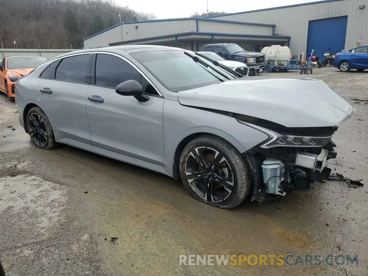 4 Photograph of a damaged car 5XXG64J28NG118517 KIA K5 2022