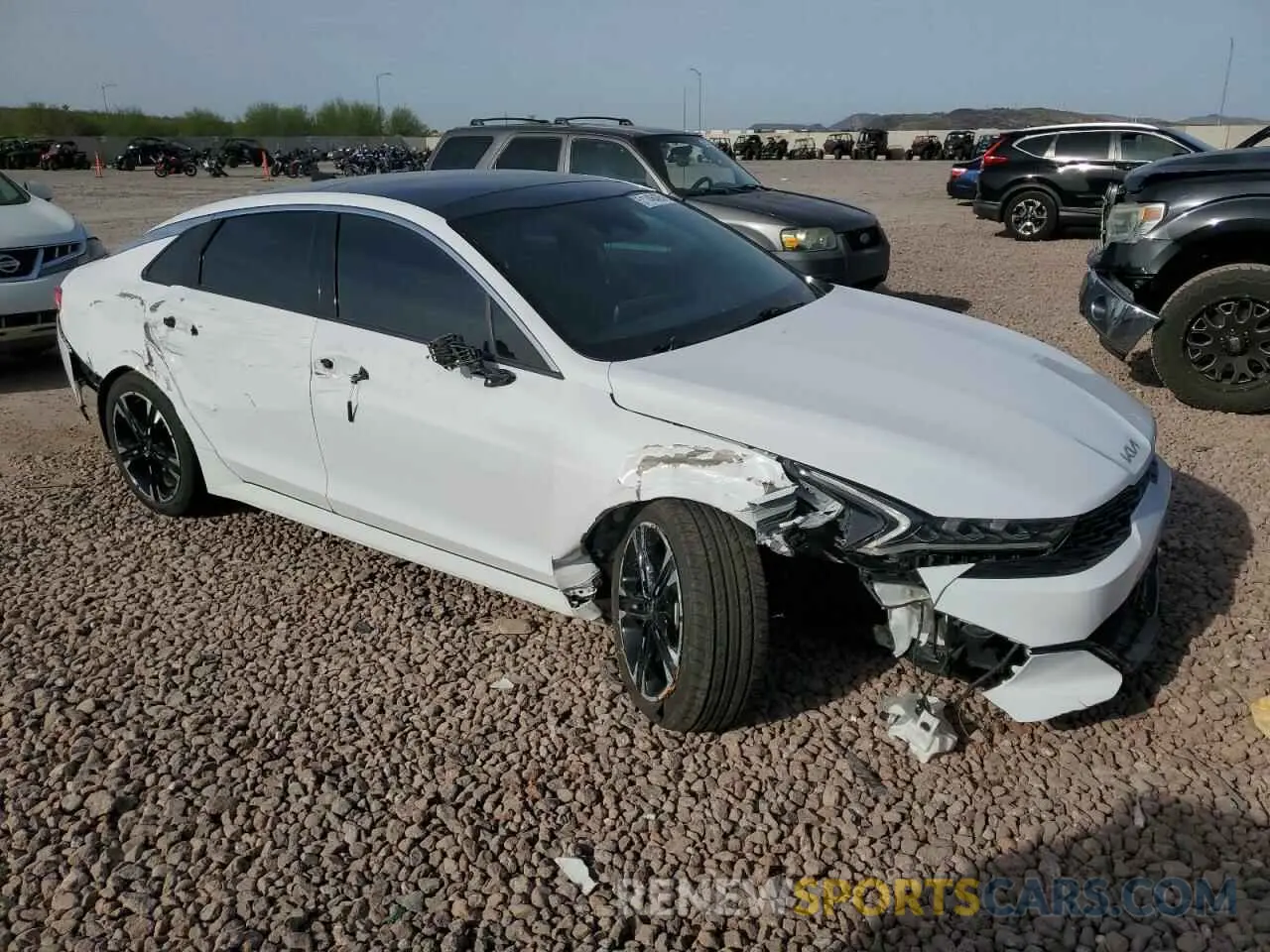 4 Photograph of a damaged car 5XXG64J29NG150487 KIA K5 2022