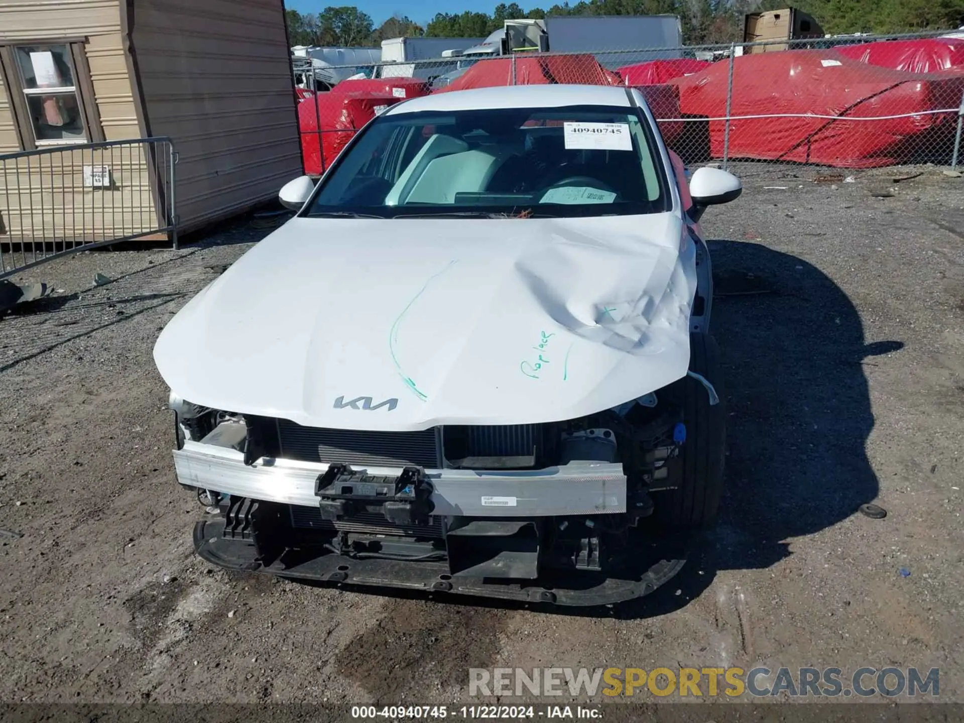 12 Photograph of a damaged car 5XXG14J21PG174672 KIA K5 2023