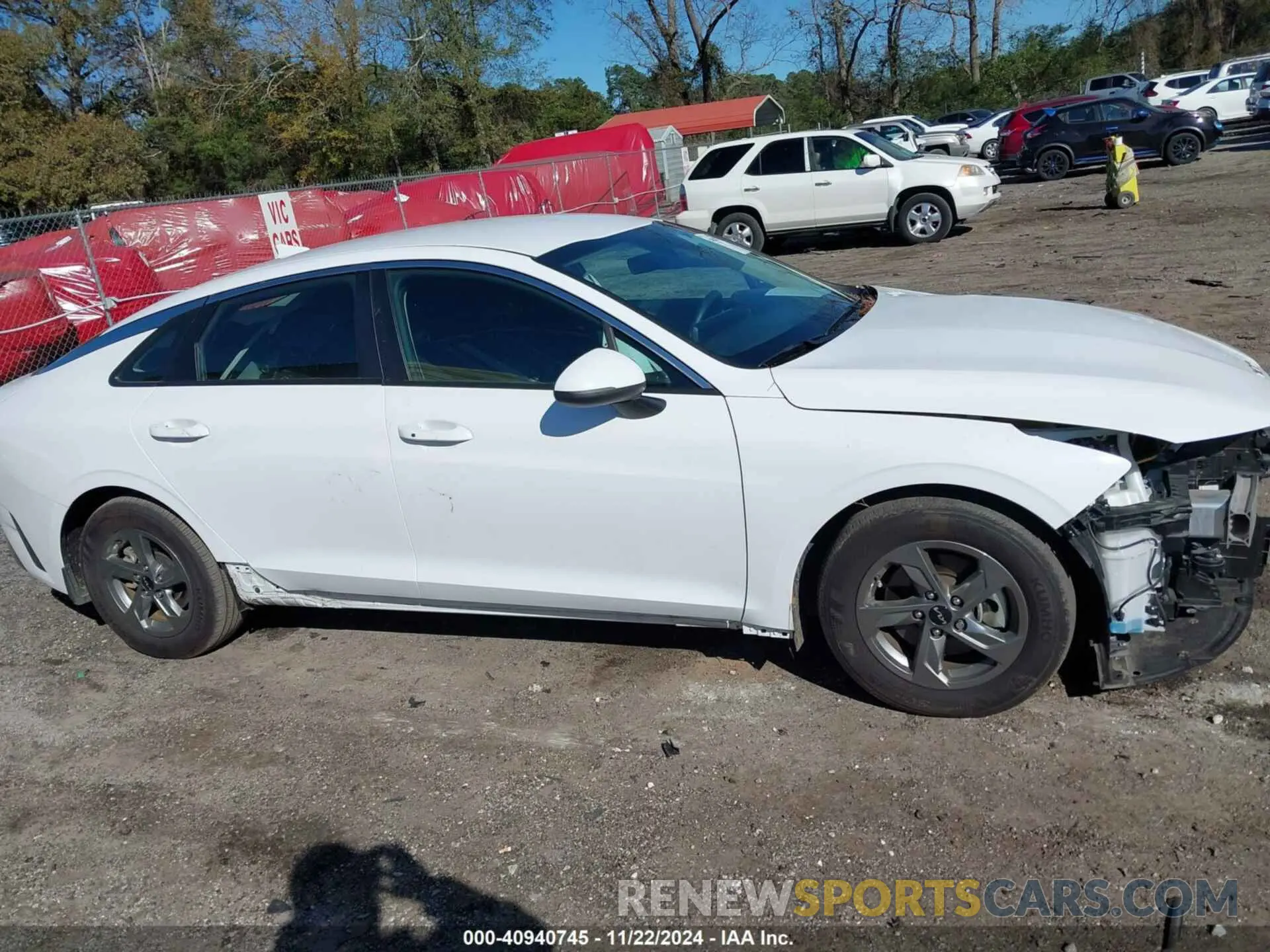 13 Photograph of a damaged car 5XXG14J21PG174672 KIA K5 2023