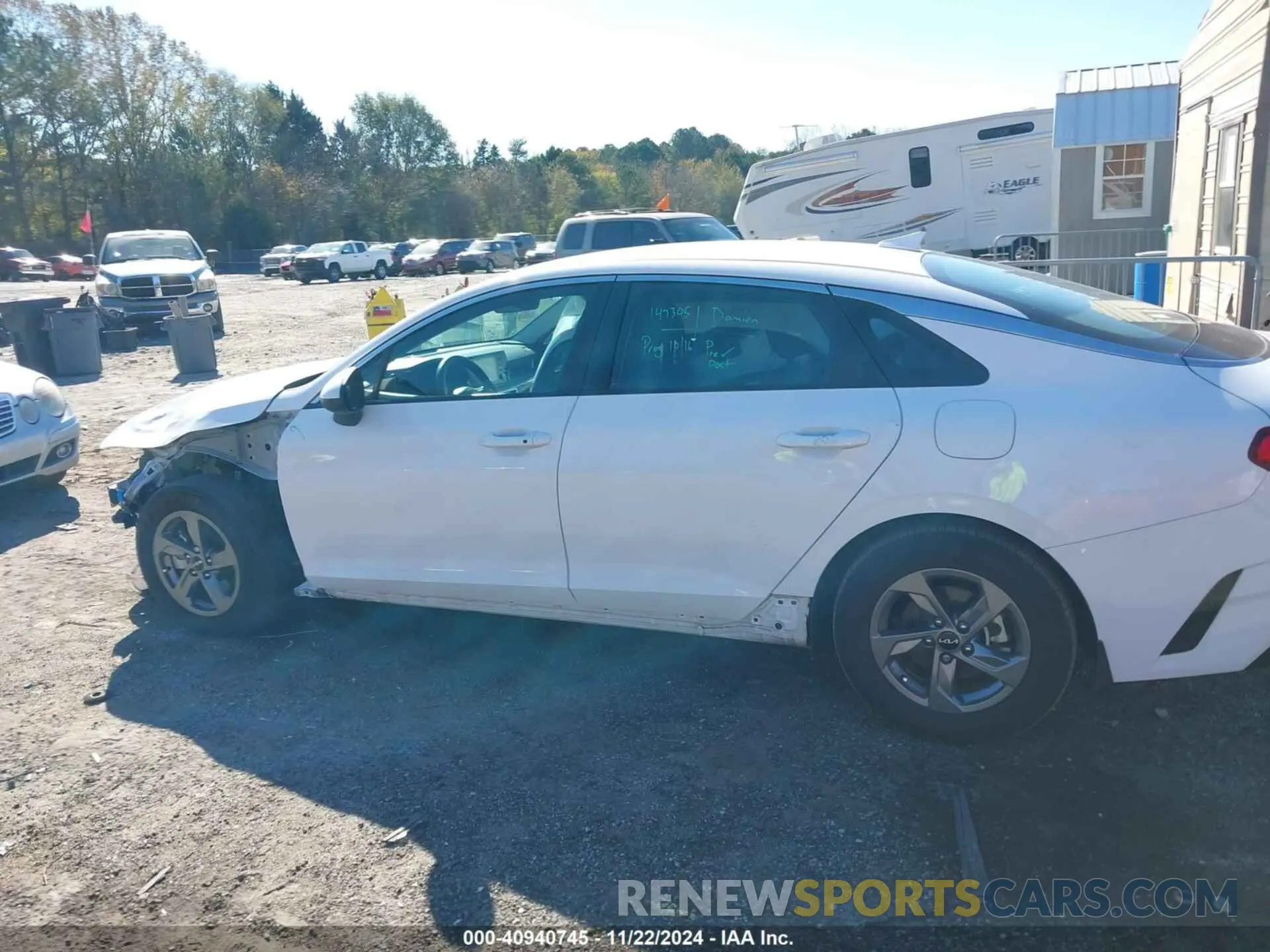 14 Photograph of a damaged car 5XXG14J21PG174672 KIA K5 2023