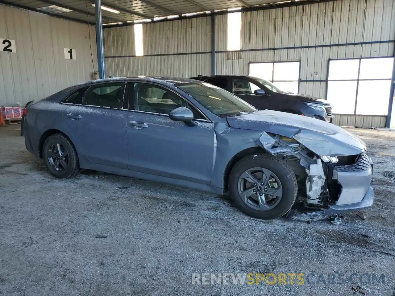 4 Photograph of a damaged car 5XXG14J21PG220582 KIA K5 2023