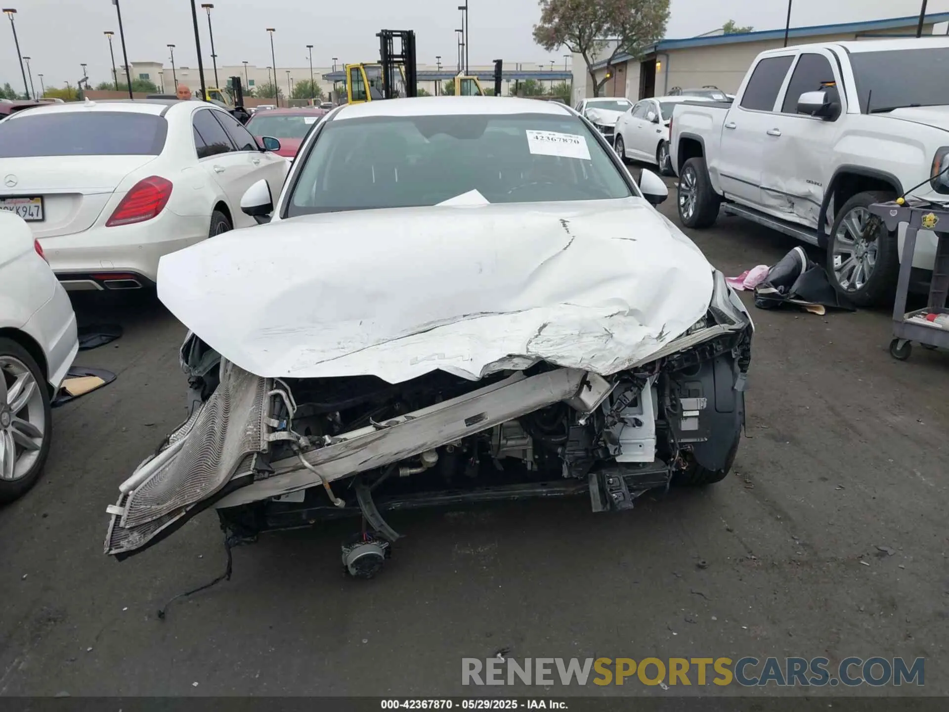 13 Photograph of a damaged car 5XXG14J22PG178570 KIA K5 2023