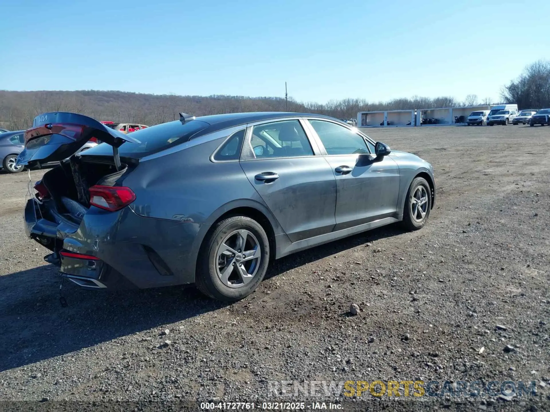 4 Photograph of a damaged car 5XXG14J22PG183185 KIA K5 2023