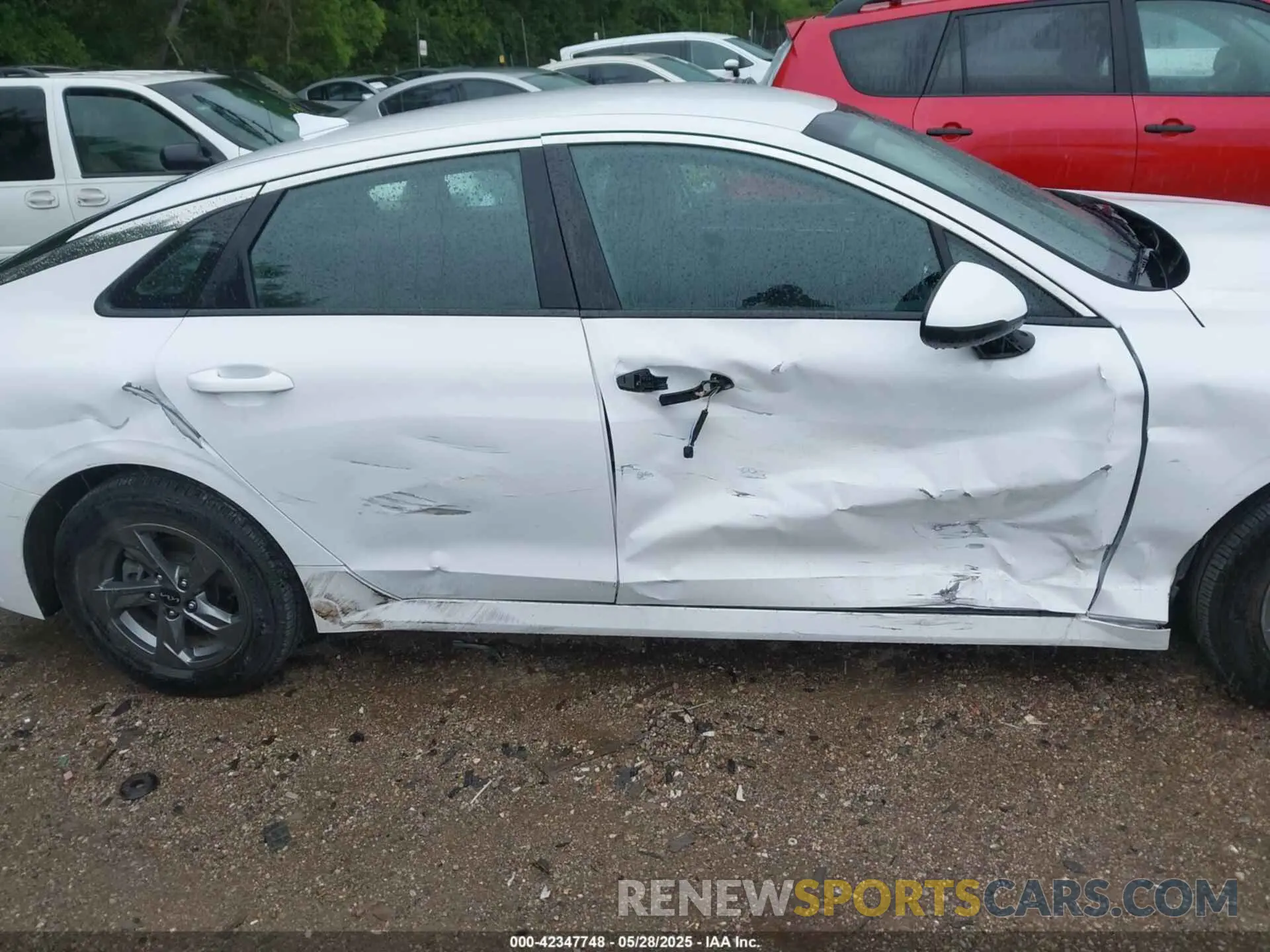 13 Photograph of a damaged car 5XXG14J24PG188842 KIA K5 2023