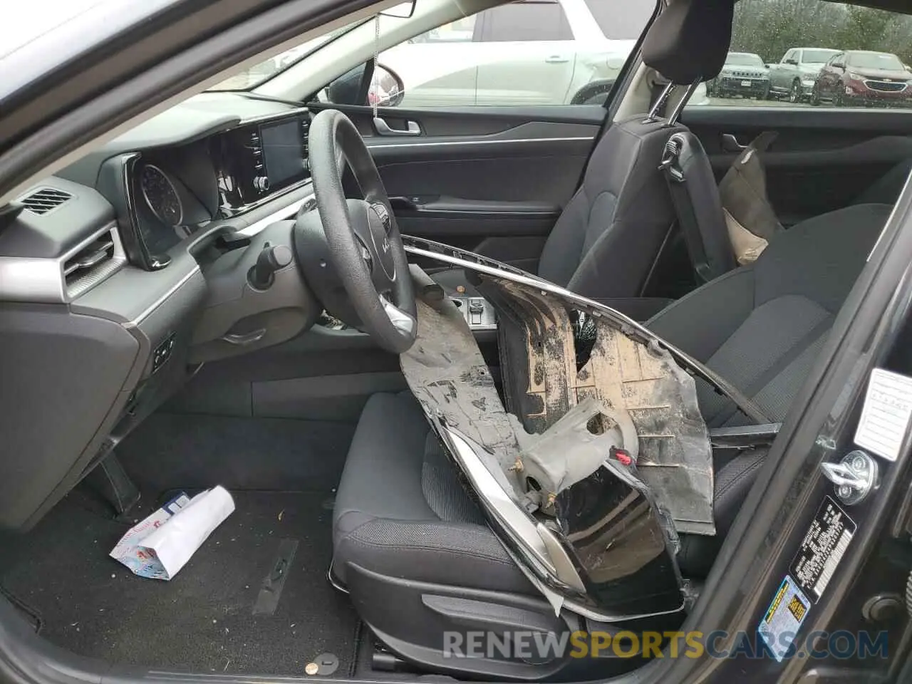 7 Photograph of a damaged car 5XXG14J24PG203727 KIA K5 2023