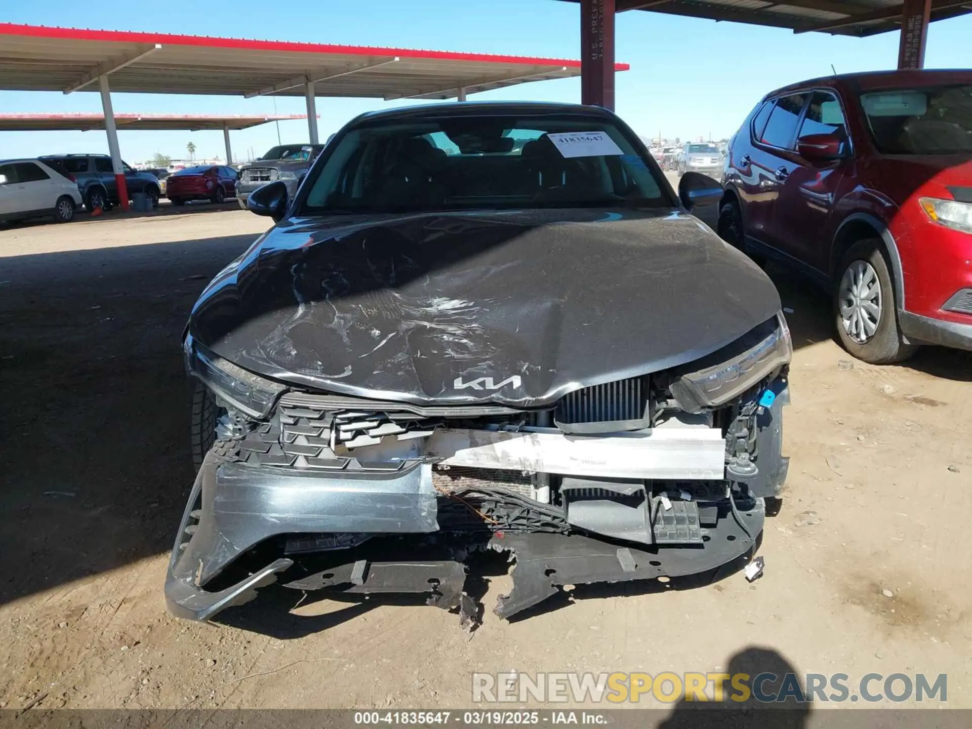 12 Photograph of a damaged car 5XXG14J24PG204036 KIA K5 2023