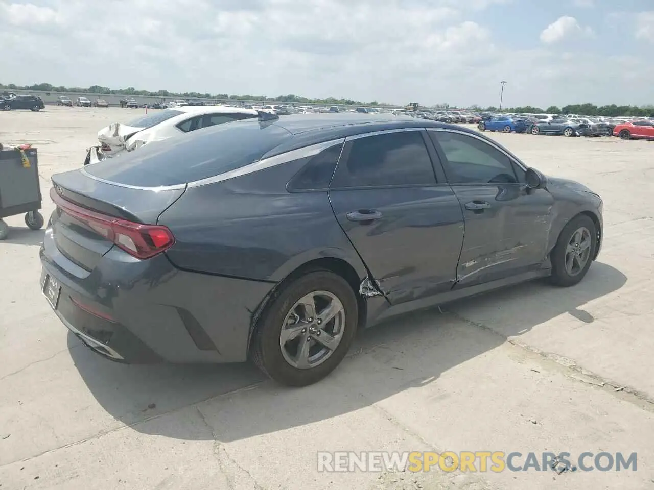 3 Photograph of a damaged car 5XXG14J24PG205185 KIA K5 2023