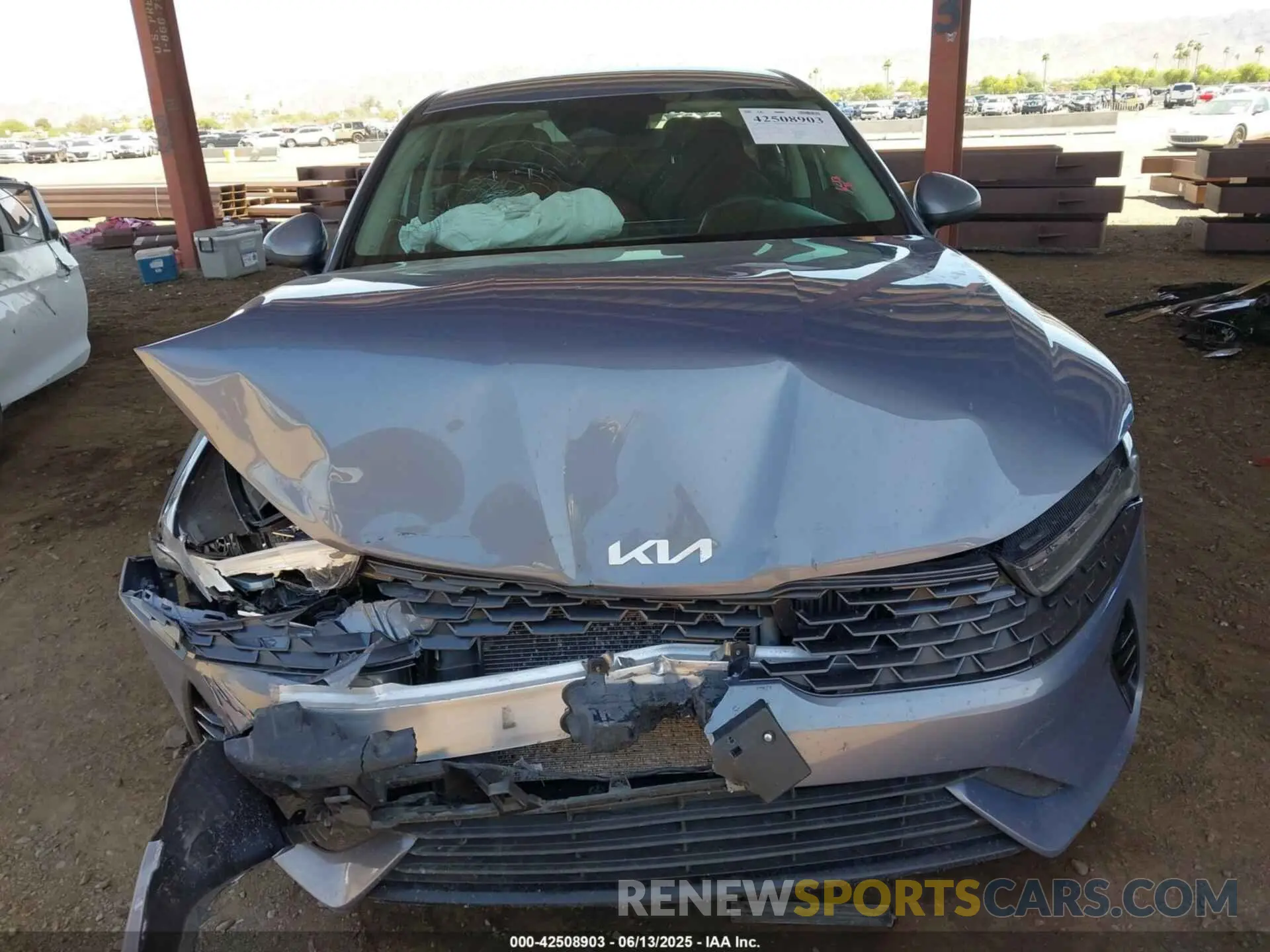 12 Photograph of a damaged car 5XXG14J25PG218074 KIA K5 2023