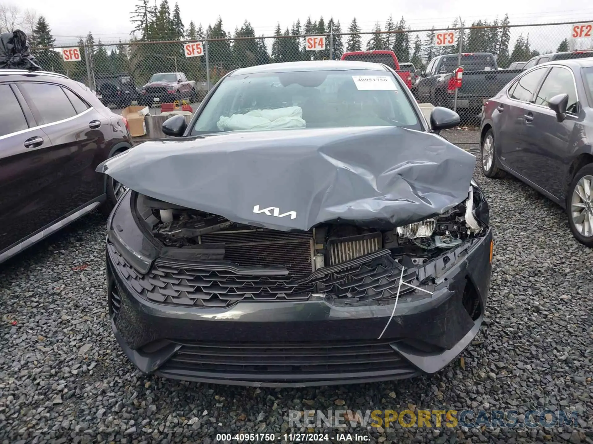12 Photograph of a damaged car 5XXG14J28PG183403 KIA K5 2023