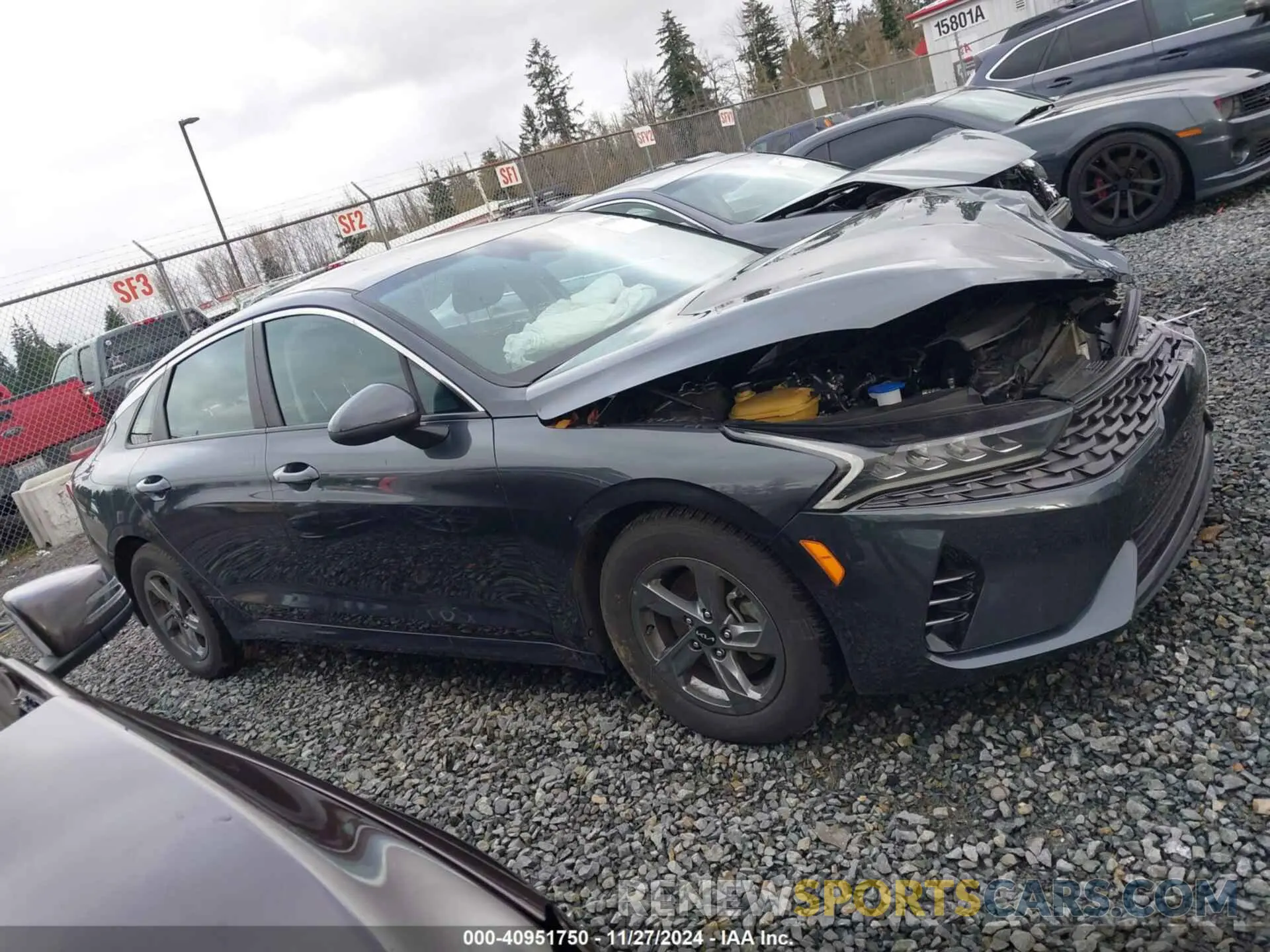 13 Photograph of a damaged car 5XXG14J28PG183403 KIA K5 2023