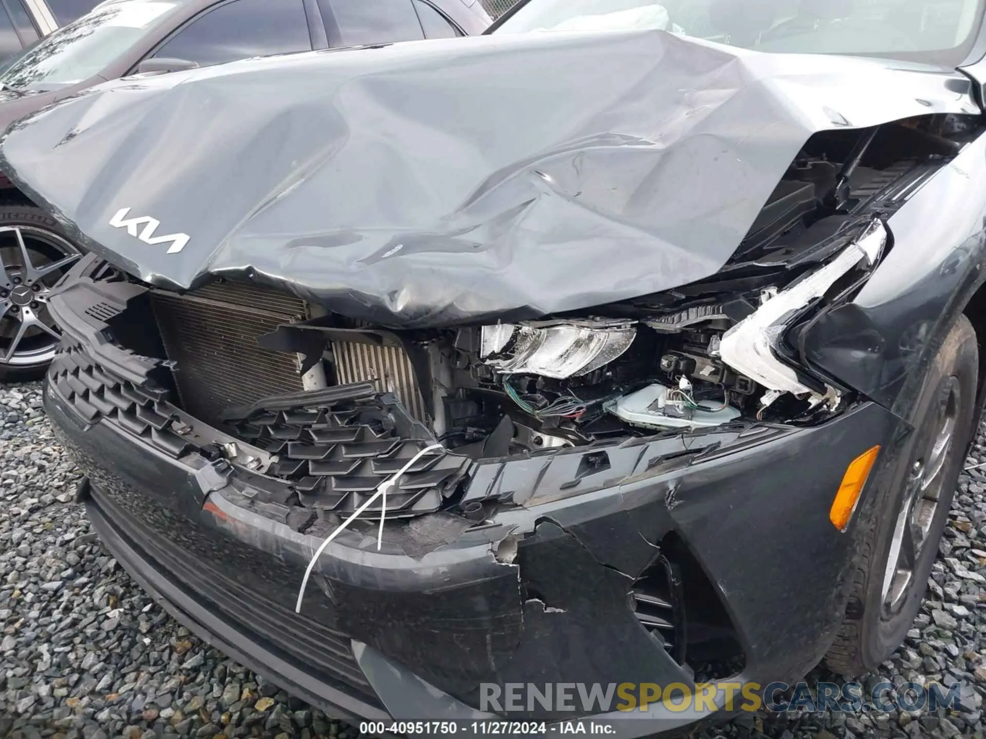 6 Photograph of a damaged car 5XXG14J28PG183403 KIA K5 2023