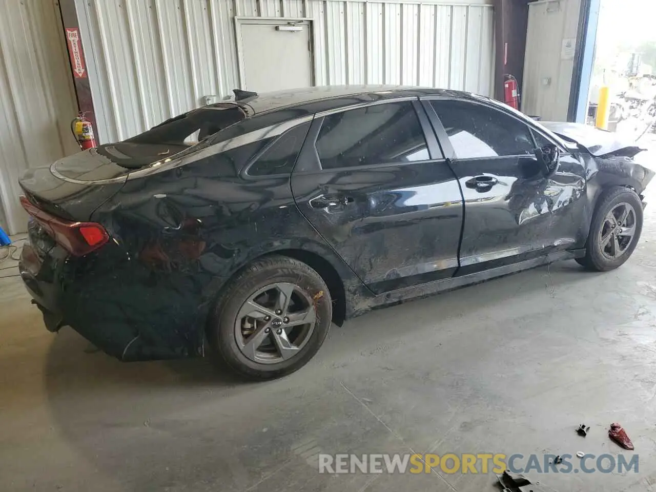 3 Photograph of a damaged car 5XXG14J28PG185233 KIA K5 2023