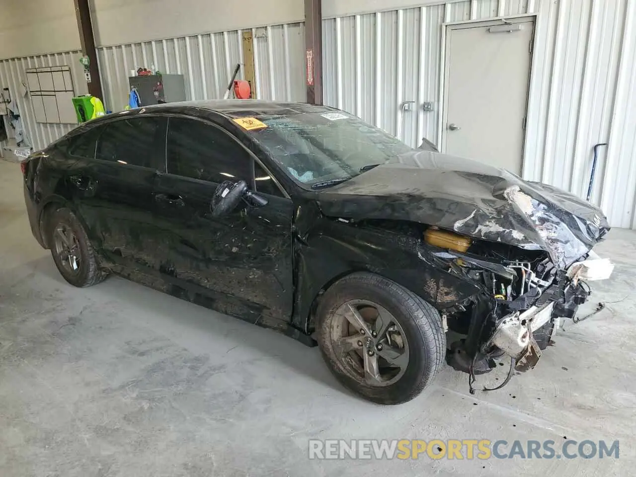 4 Photograph of a damaged car 5XXG14J28PG185233 KIA K5 2023