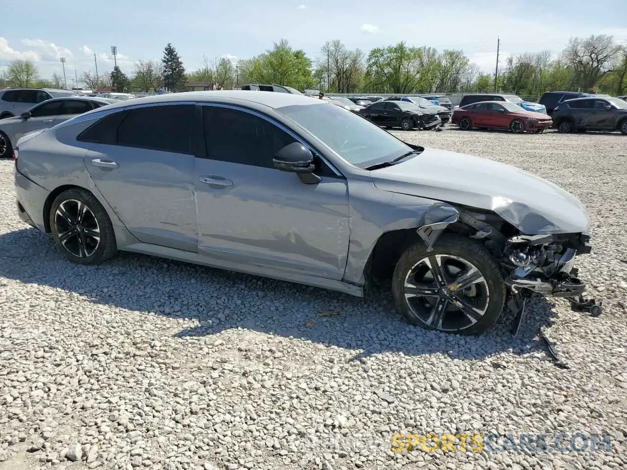 4 Photograph of a damaged car 5XXG64J25PG180511 KIA K5 2023
