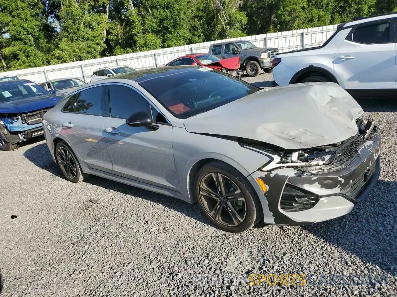 4 Photograph of a damaged car 5XXG64J26PG169131 KIA K5 2023
