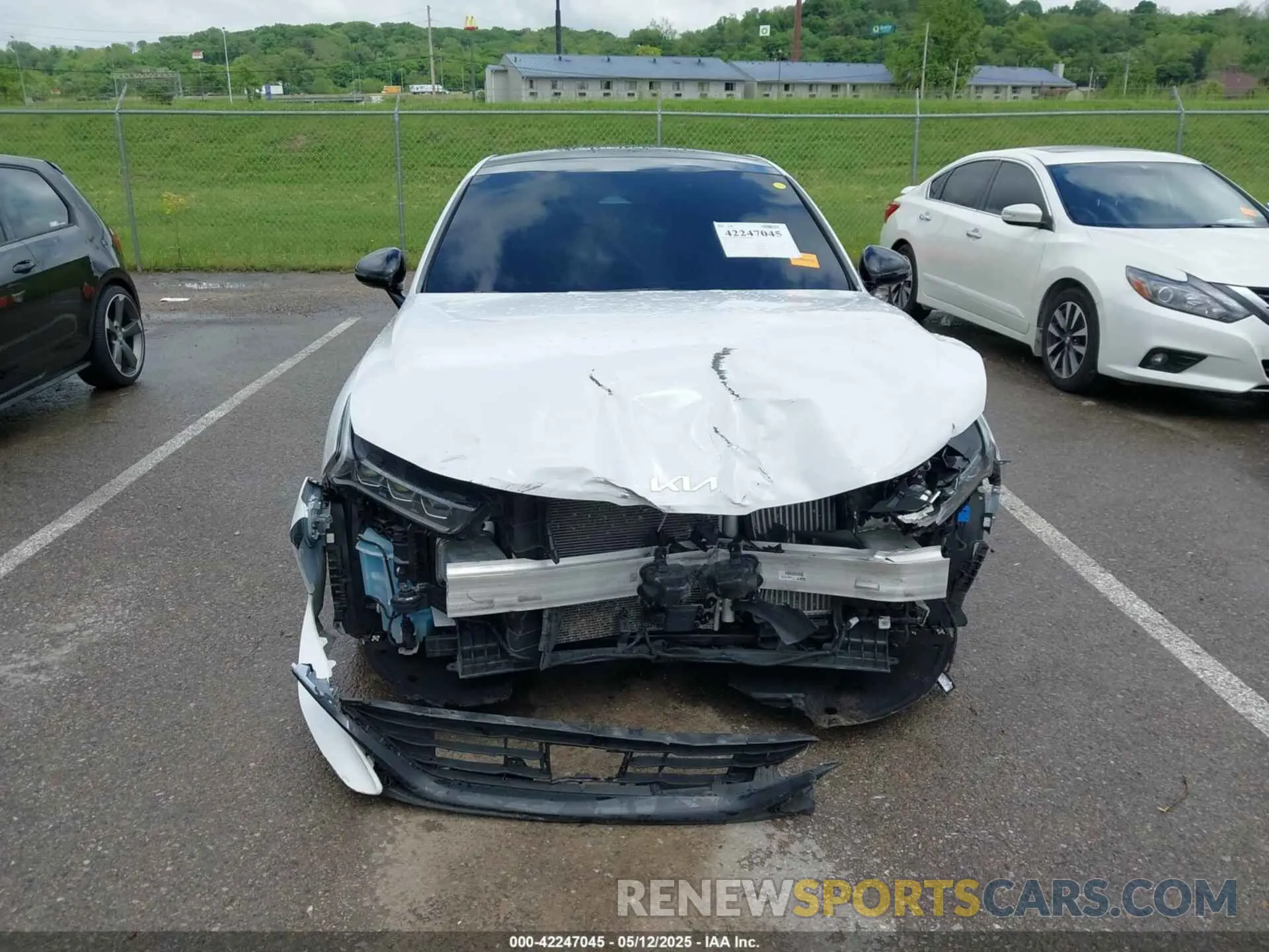 13 Photograph of a damaged car 5XXG64J27RG250383 KIA K5 2024