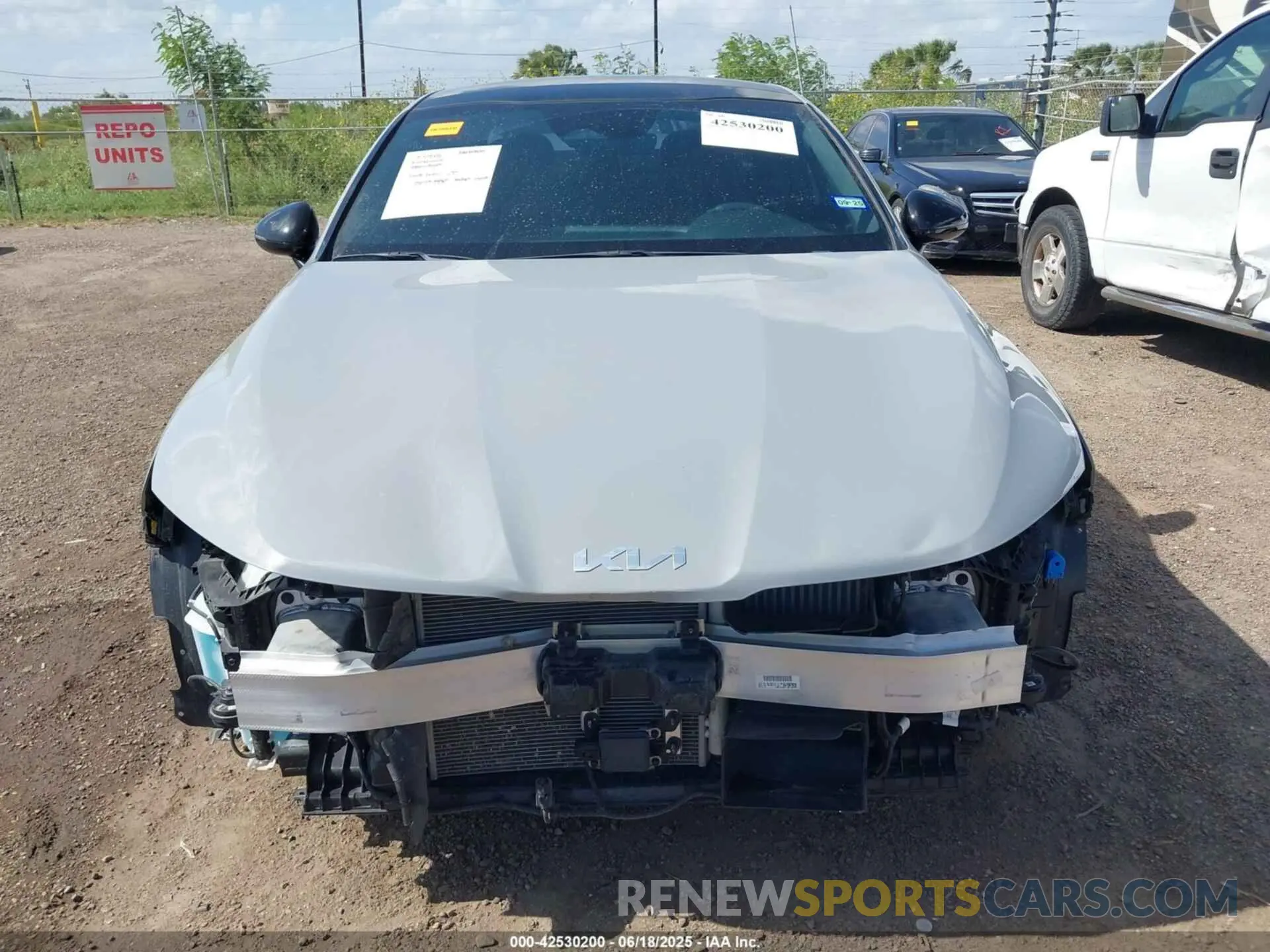13 Photograph of a damaged car 5XXG64J28RG250263 KIA K5 2024