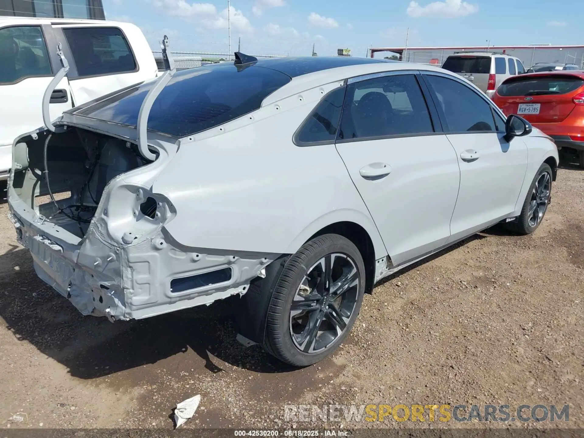 4 Photograph of a damaged car 5XXG64J28RG250263 KIA K5 2024