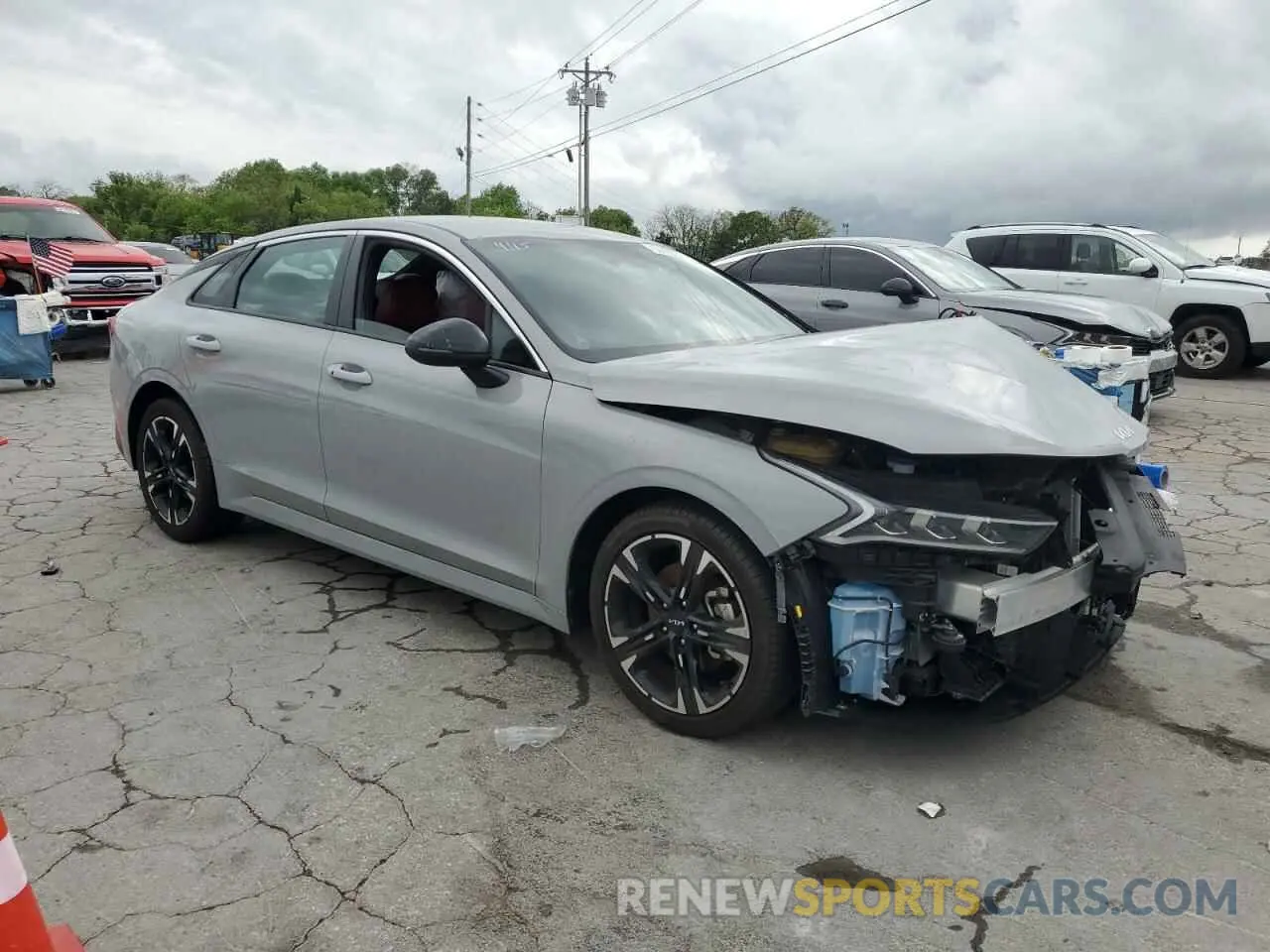 4 Photograph of a damaged car 5XXG64J29RG235304 KIA K5 2024