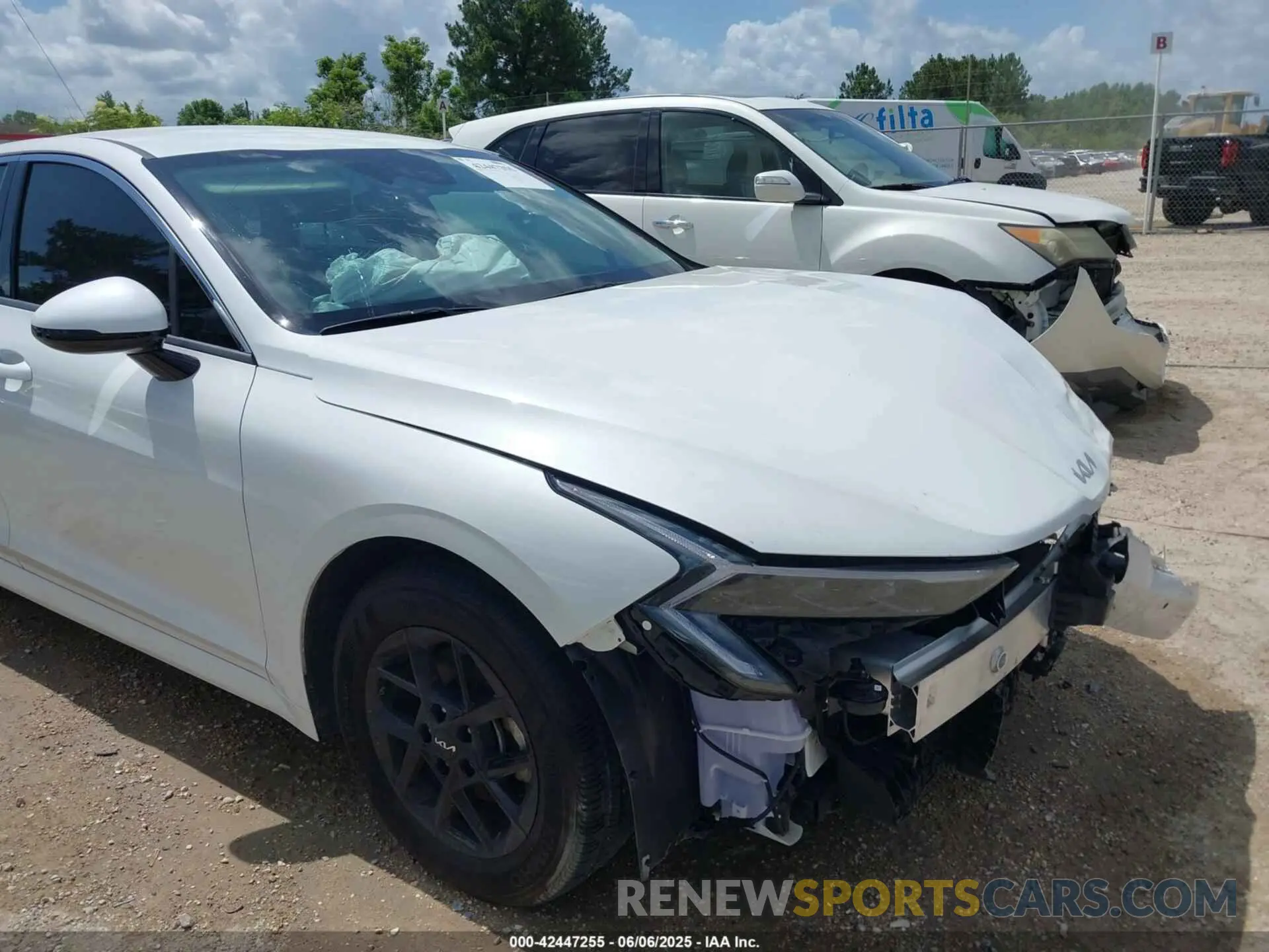 19 Photograph of a damaged car KNAG24J78S5293497 KIA K5 2025