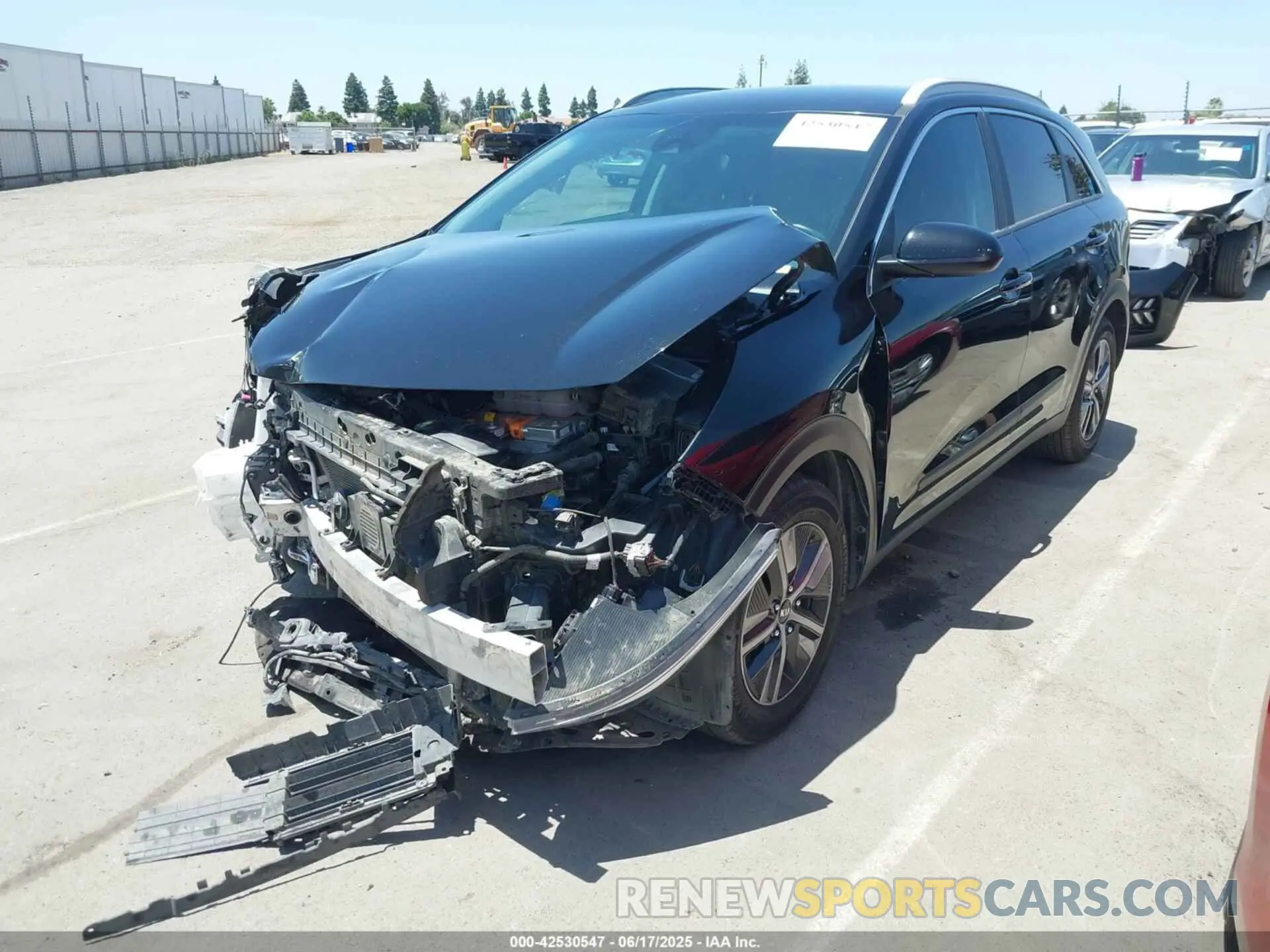 2 Photograph of a damaged car KNDCB3LC0M5479995 KIA NIRO 2021